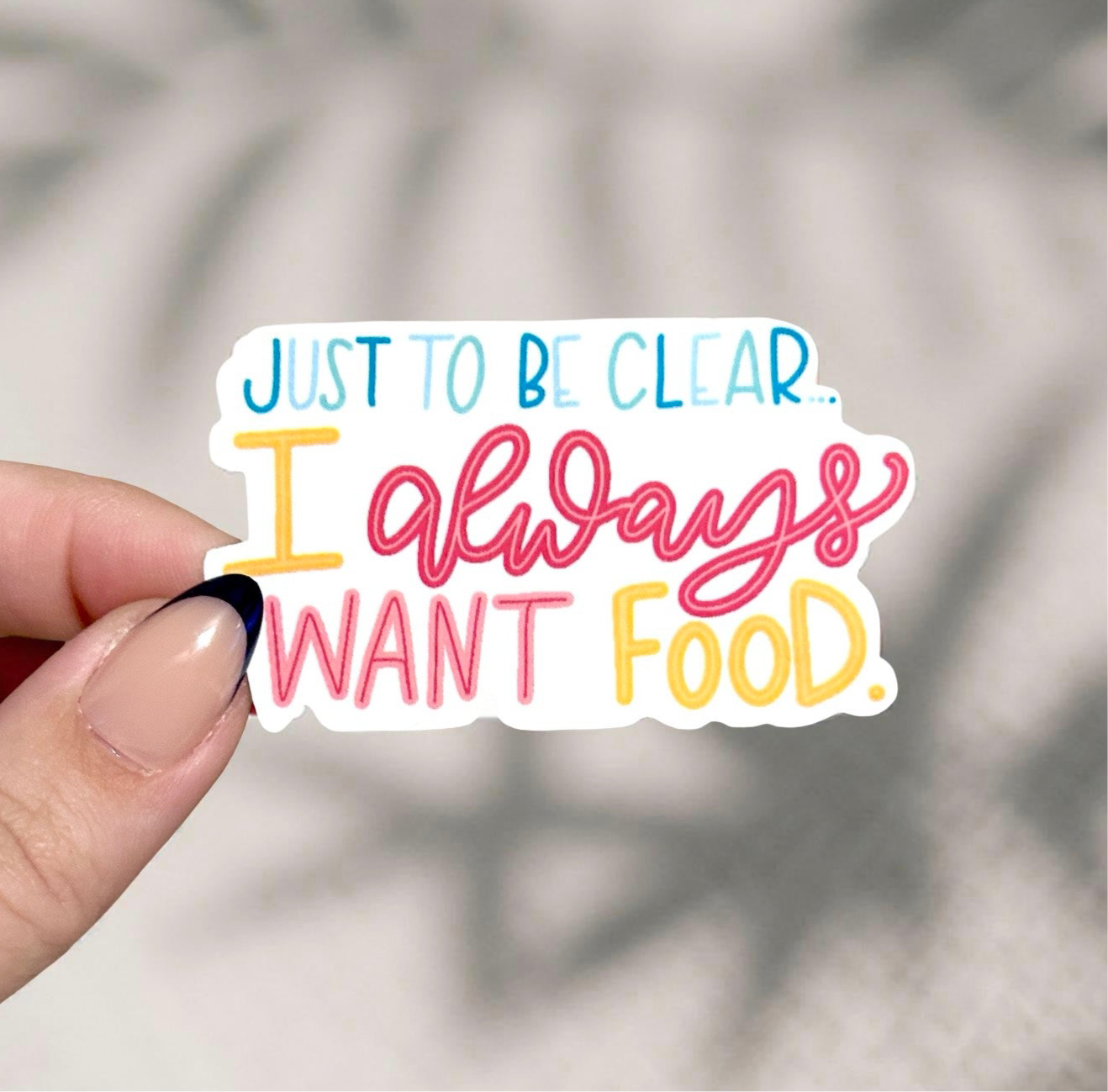Had holding a sticker that says just to be clear I always want food
