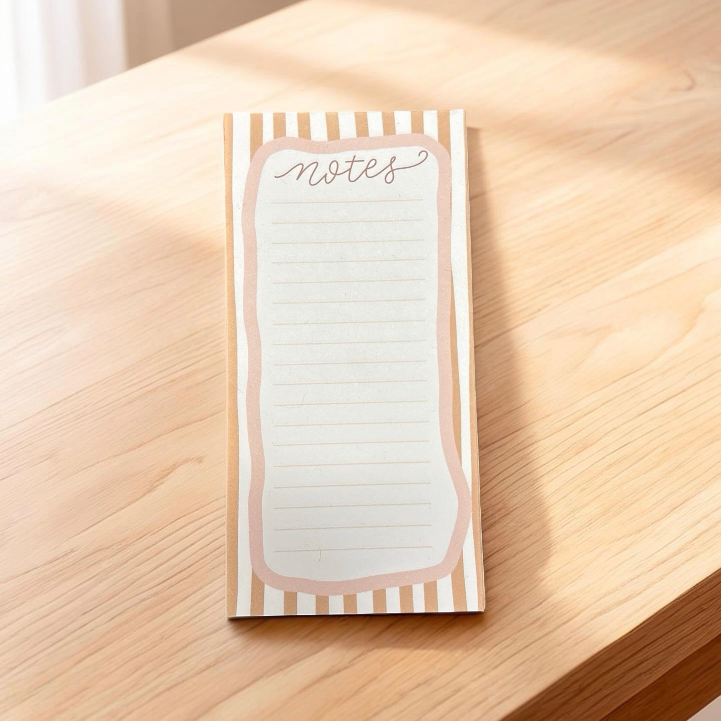 Soft striped notepad on desk 