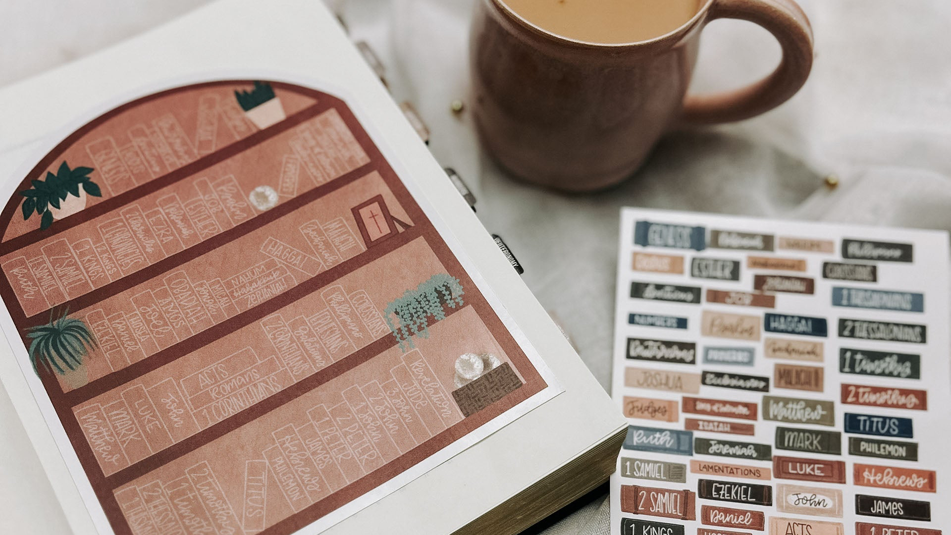 Load video: Showcasing the Bible Reading tracker being used with the Leviticus sticker being added to the Bible bookshelf