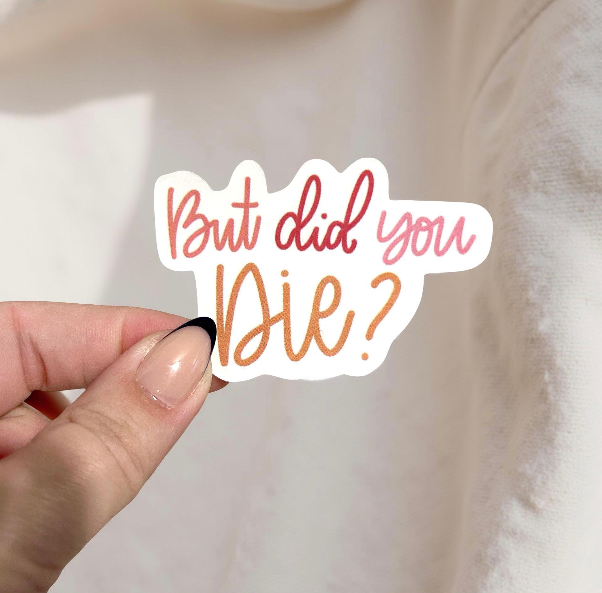 hand holding a sticker that says but did you die, motivational sticker, encouraging waterproof sticker