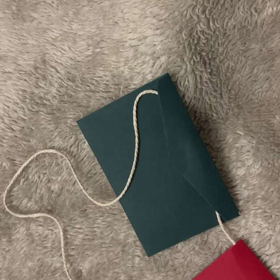 video of upclose details of envelope garland